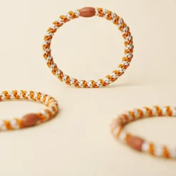 Haargummi KKNEKKI Slim - terracotta elfenbein glitter