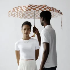 Regenschirm mit Entenkopf Griff aus Holz braun weiß gemustert - Original Duckhead Taschenschirm