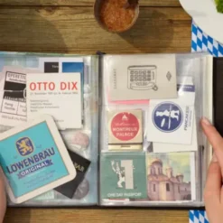 Reisetagebuch TripBook Solena - buntes Travelbuch mit 64 Sammelfächern & 2 Notizheften