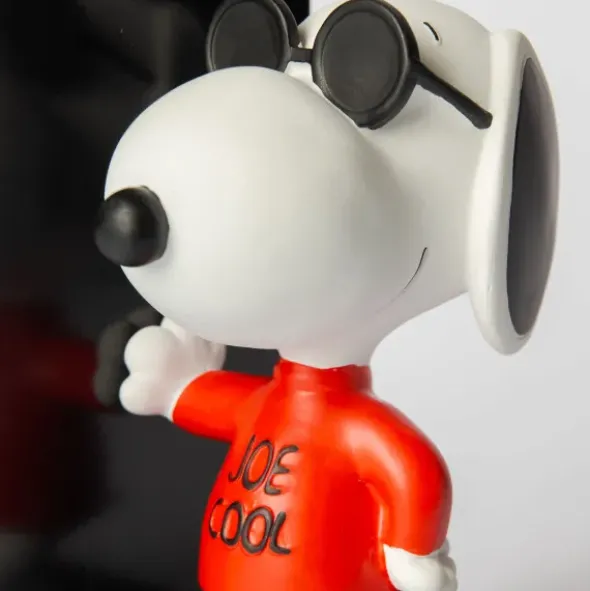 Snoopy Buchstütze Joe Cool – Peanuts Bücherhalter schwarz mit Snoopy Figur