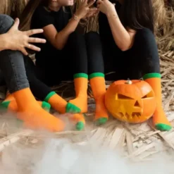 Socken Halloween Kürbis in orange Gr. 40-43 - Gesicht selbstleuchtend bei Nacht